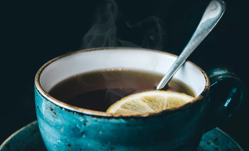 A cup of tea with lemon